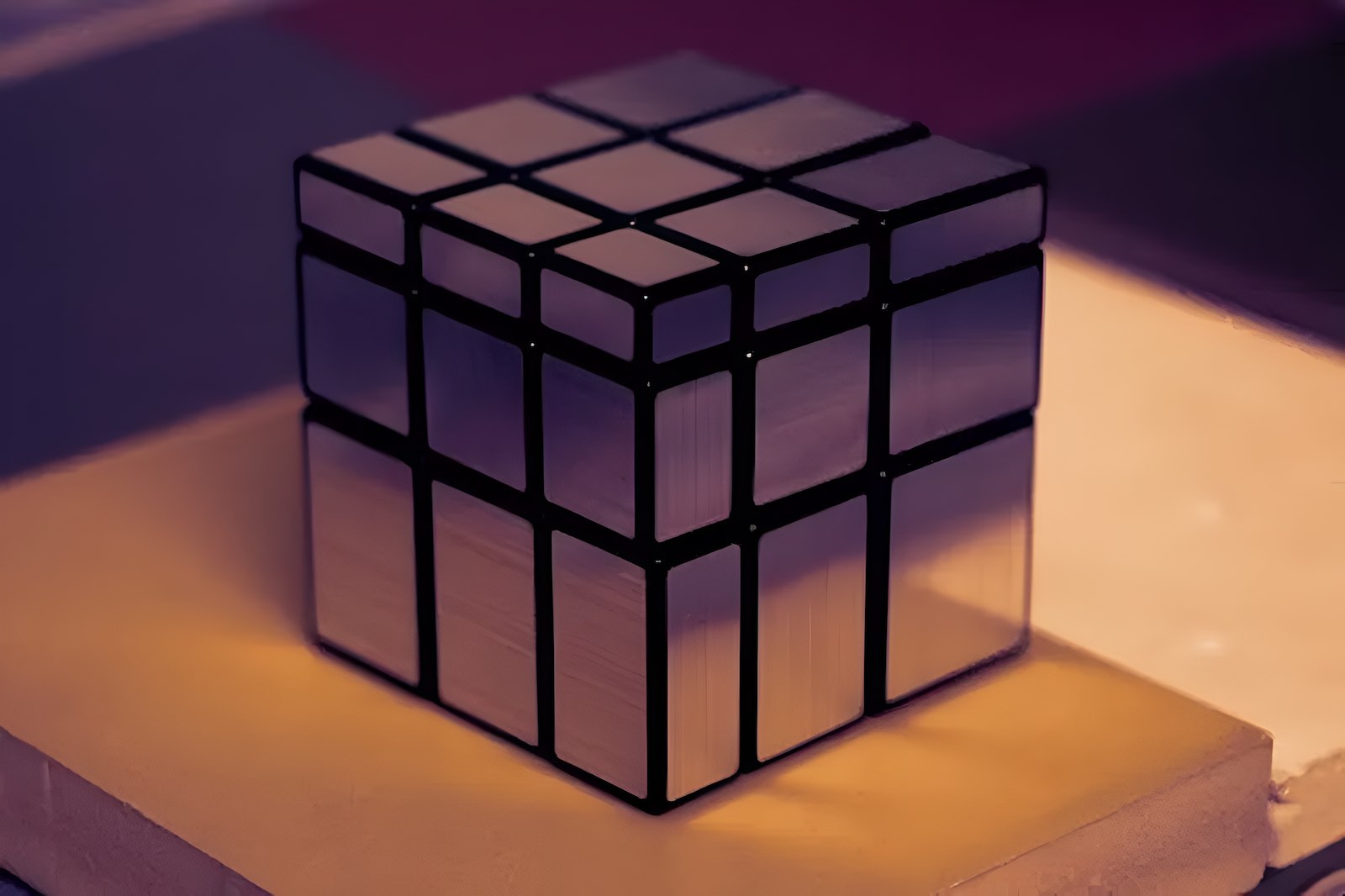 Final Reflection: A Solved Mirror Cube Resting on a Wooden Table